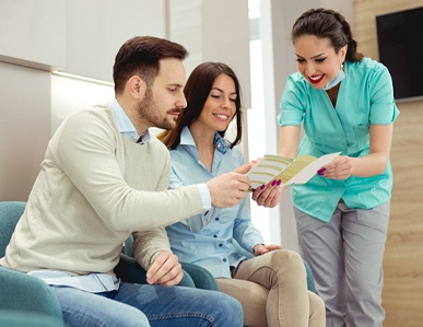 Couple learning about how to use dental insurance