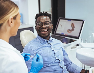 a man speaking with a dentist