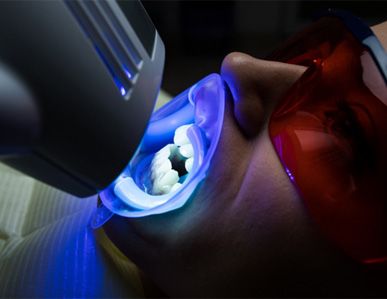 A woman getting teeth whitening in Superior
