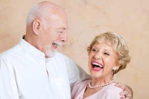 Laughing senior couple