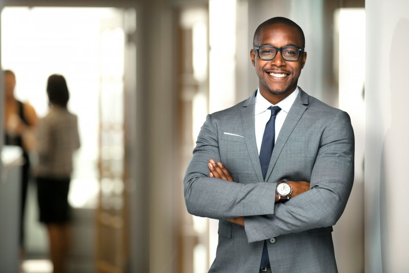 man in suit smiling in Superior