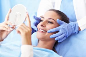 dentist with smiling patient 